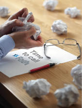 Tearing up another crumpled paper ball for the pile