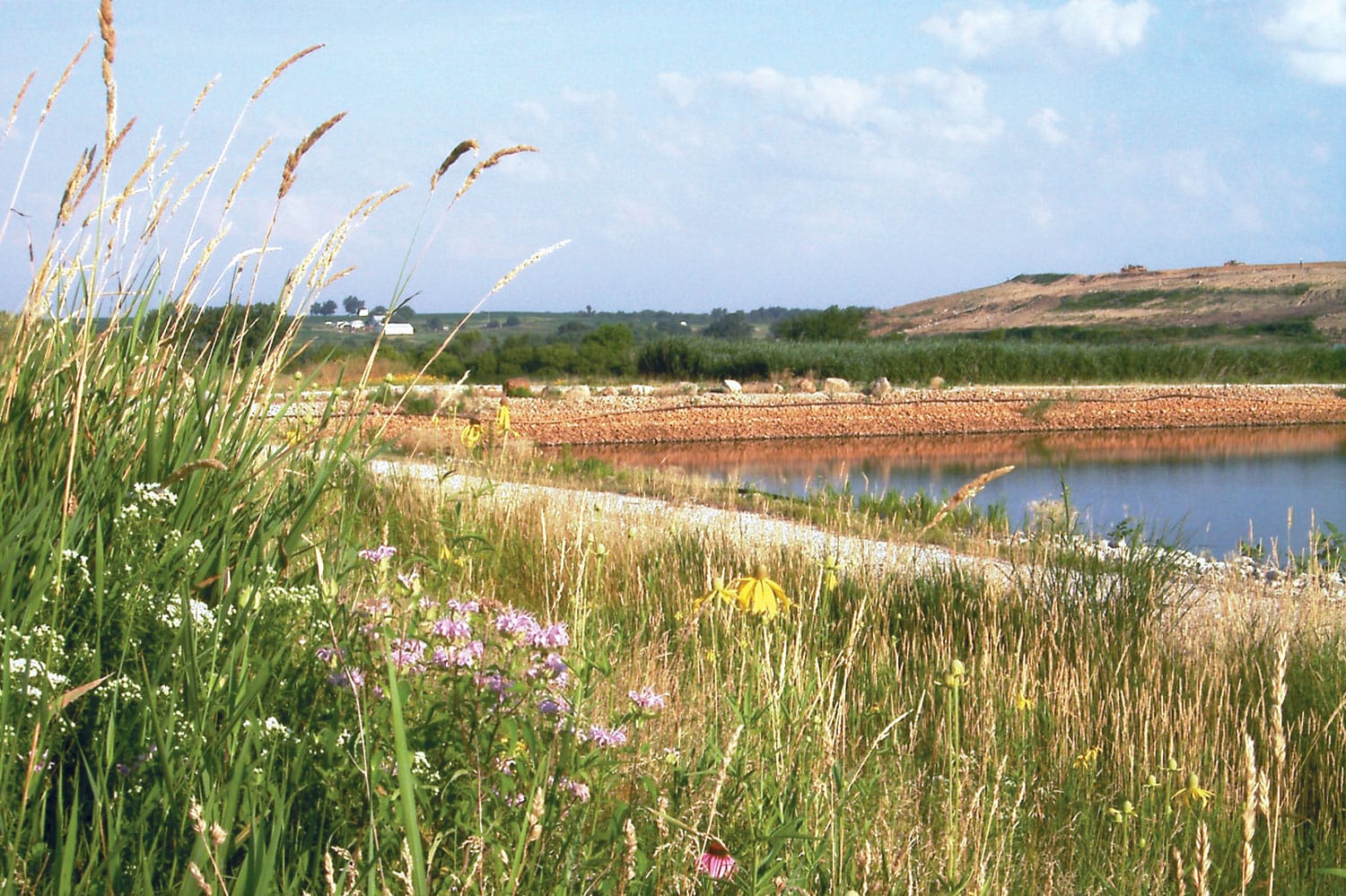 Landfill planning permitting design and construction - water waste retention pond