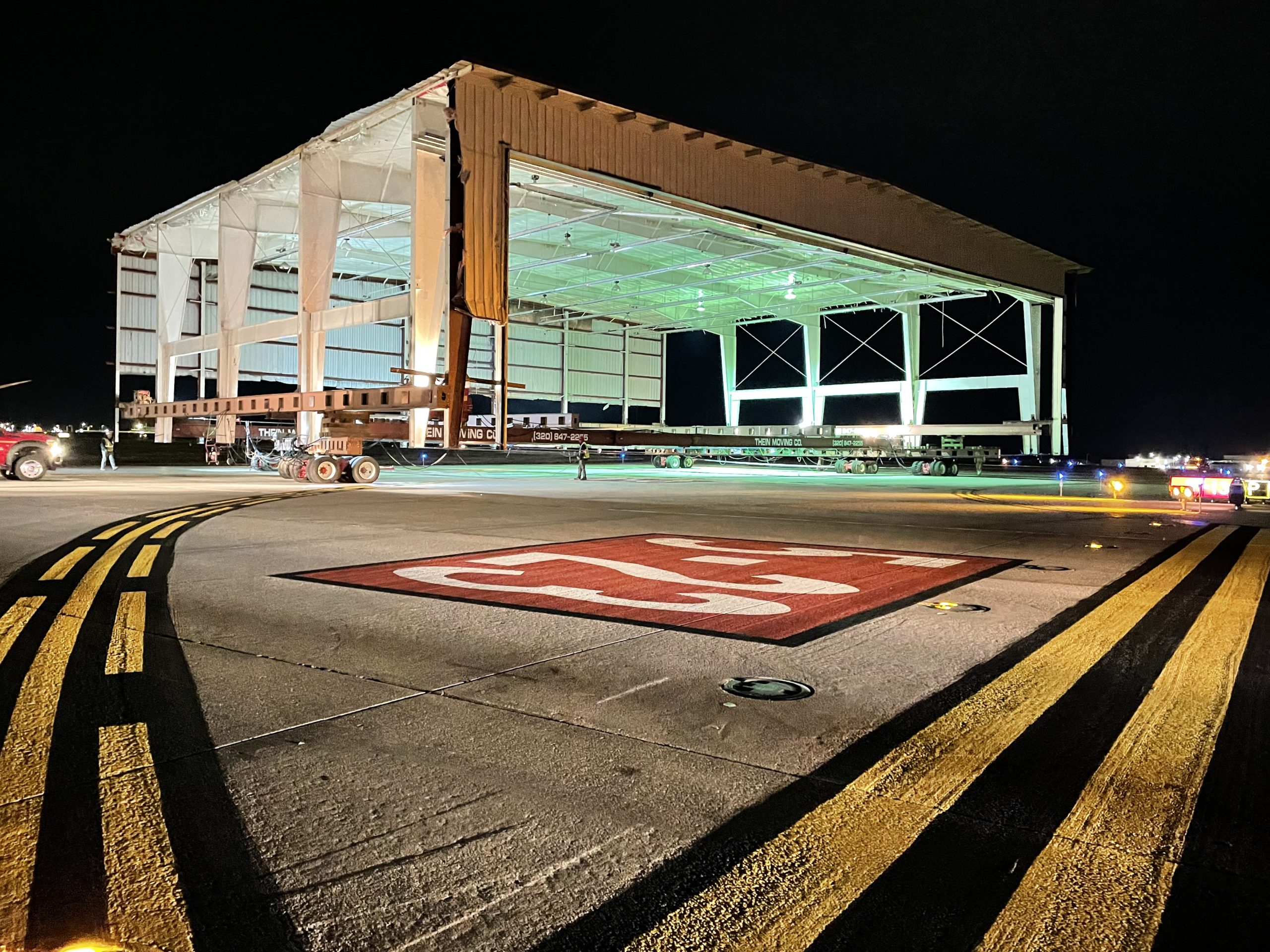 Hangar Relocation at Night on Runway