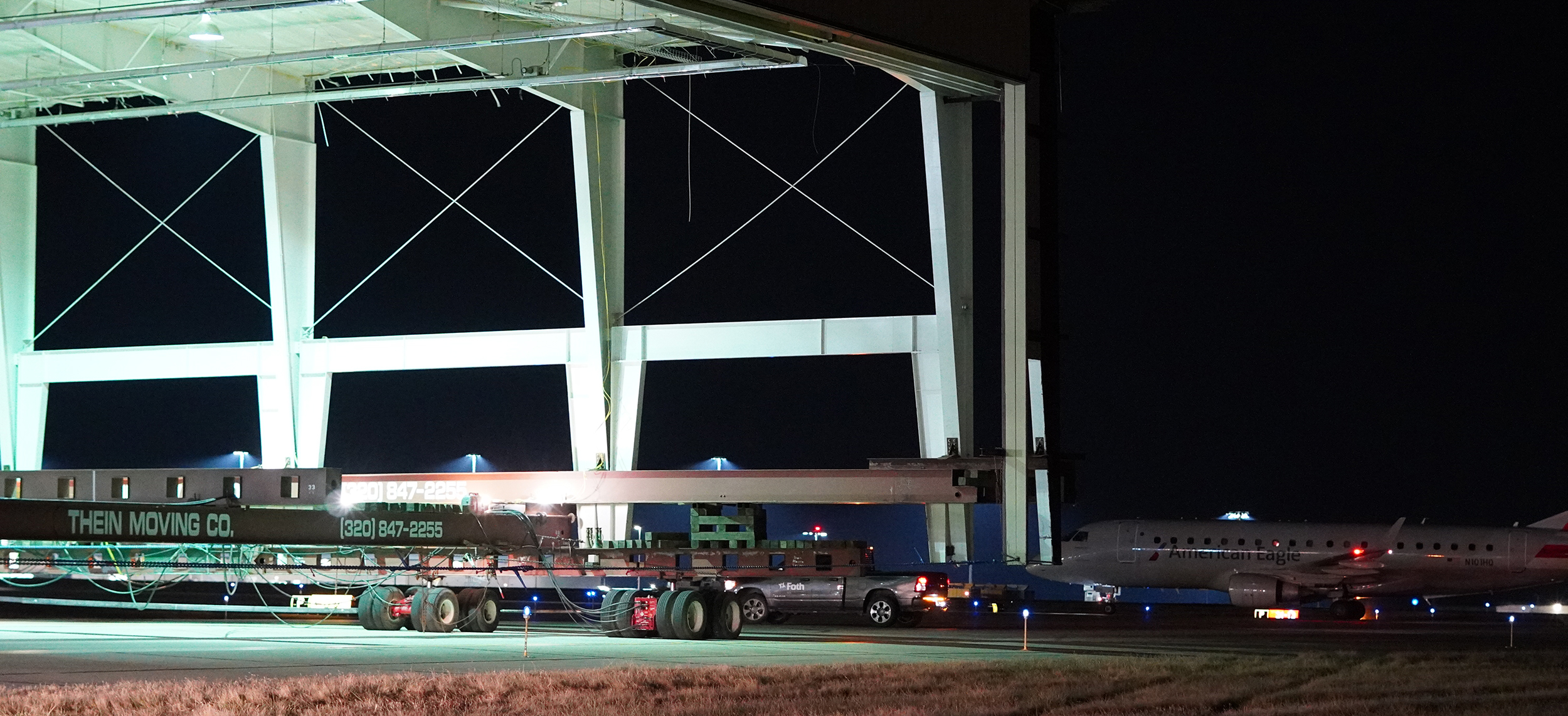 Hangar Relocation at Night on Runway