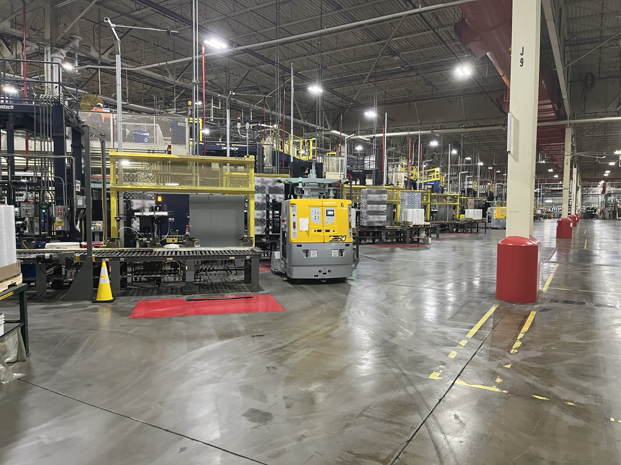 Laser guided vehicles move product in a warehouse