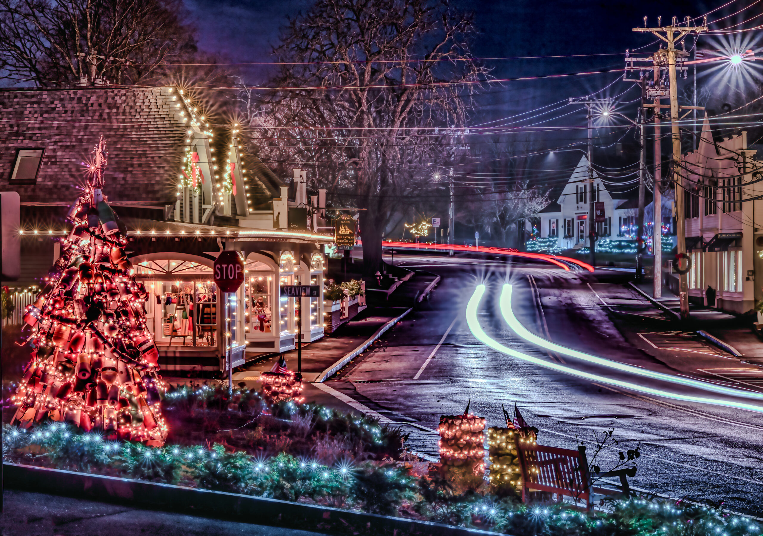 Nighttime shot of a downtown area decorated for the holidays